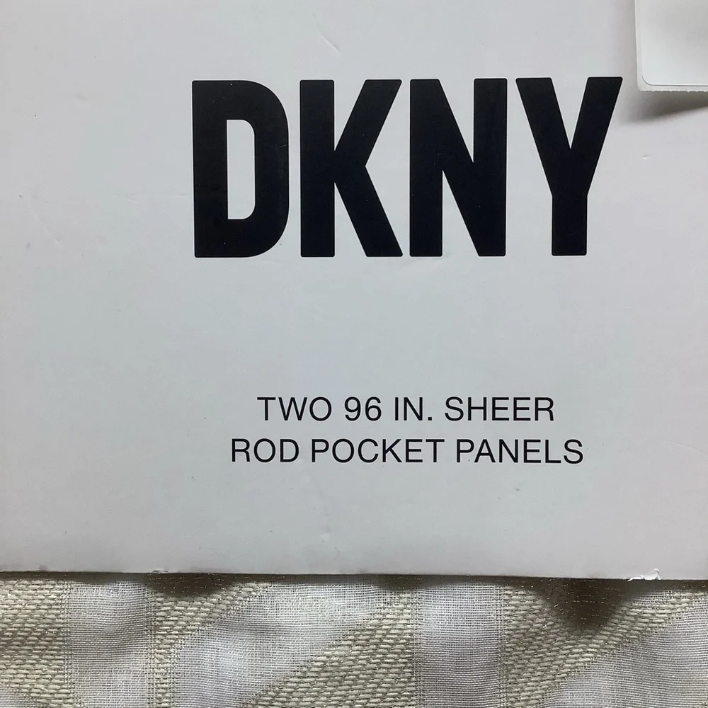 DKNY Set of Two 96 Inch Sheer Rod Pocket Panels in Cream Shimmer. New With Tags